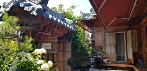 an outside view of a house with a garden at Starlight Rest Area in Jeonju