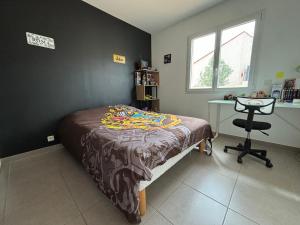 Ένα ή περισσότερα κρεβάτια σε δωμάτιο στο Villa dans le sud de la France