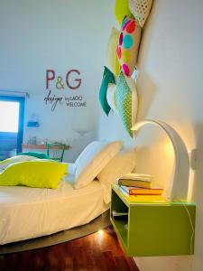 Postel nebo postele na pokoji v ubytování P&G design by Lago Welcome Enna