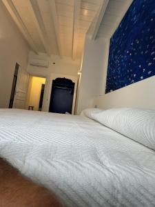 Postel nebo postele na pokoji v ubytování Appartamenti Sparanello