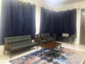 Zona de estar de Homestay Kakak Adek with private pool sempadan Perak,Penang dan Kedah