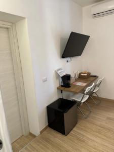 TV a/nebo společenská místnost v ubytování B&B Casarco
