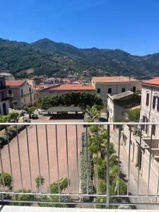 a view of a city from a balcony at Casa Matilde in Gioiosa Marea