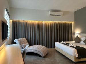 Postel nebo postele na pokoji v ubytování Hotel Arissa + 20 fotografií