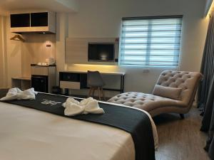 Postel nebo postele na pokoji v ubytování Hotel Arissa