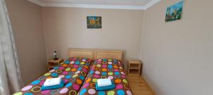 Letto o letti in una camera di Guesthouse Robi