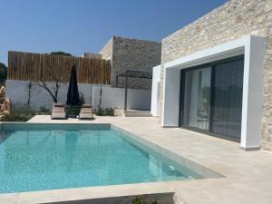 Kolam renang di atau dekat dengan Mesogi Villas, brand new modern, stylish villas, private pool, seaviews