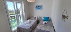 Posteľ alebo postele v izbe v ubytovaní Beach view - primera linea lujo