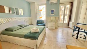 Posteľ alebo postele v izbe v ubytovaní Azur apartment on Massena street