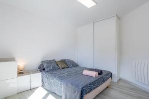 Posteľ alebo postele v izbe v ubytovaní Maison de vacances Chez André