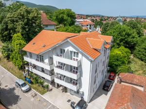 an overhead view of a building with an orange roof at Milutinn-Trešnja in Soko Banja +34 photos