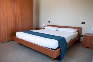 Postel nebo postele na pokoji v ubytování Bagno Lunezia
