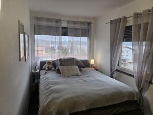 Ένα ή περισσότερα κρεβάτια σε δωμάτιο στο Apartments Faak