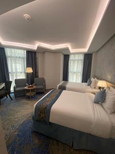 Postel nebo postele na pokoji v ubytování Valy Hotel