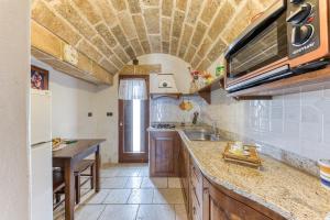 Nhà bếp/bếp nhỏ tại Il Papavero Rosso - Cozy Villa