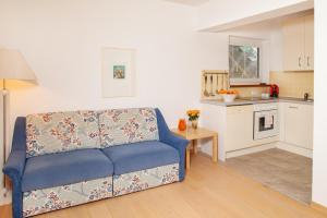 Kuchyň nebo kuchyňský kout v ubytování Seeapartments Kärnten