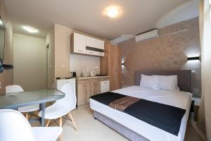 Kuchyň nebo kuchyňský kout v ubytování Villa Glamour