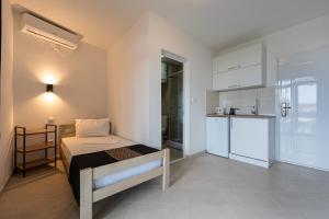 Postel nebo postele na pokoji v ubytování Villa Glamour