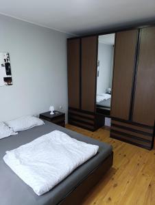 Voodi või voodid majutusasutuse Harmonia guesthouse toas