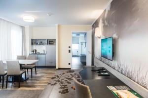 MASEVEN Stuttgart SI Centrum ehem SI-SUITES的厨房或小厨房
