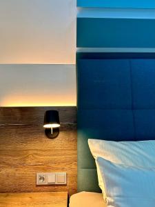 Postel nebo postele na pokoji v ubytování Hotel Mainpromenade ***S