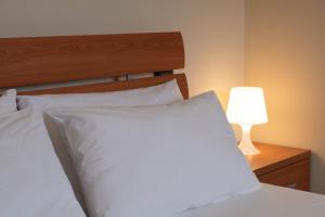 Postel nebo postele na pokoji v ubytování Bagno Lunezia