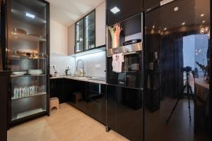 Kuchyň nebo kuchyňský kout v ubytování Villa Glamour