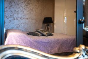 Postel nebo postele na pokoji v ubytování Villa Glamour