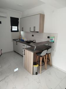 Kuchyň nebo kuchyňský kout v ubytování Apartman Vito
