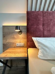 Postel nebo postele na pokoji v ubytování Hotel Mainpromenade ***S