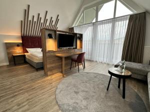 Postel nebo postele na pokoji v ubytování Hotel Mainpromenade ***S