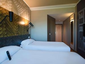 Letto o letti in una camera di Ibis Rabat Agdal
