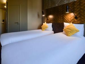 Letto o letti in una camera di Ibis Rabat Agdal