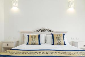 Кровать или кровати в номере Hotel Vecchia Marina