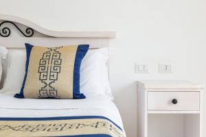 Кровать или кровати в номере Hotel Vecchia Marina