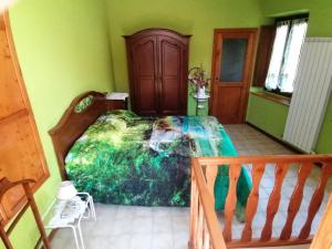 Ένα ή περισσότερα κρεβάτια σε δωμάτιο στο Locazione Turistica Pane Amore e Fantasia