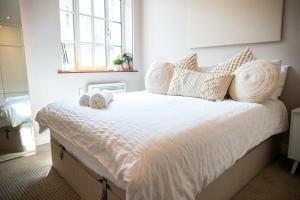 Ένα ή περισσότερα κρεβάτια σε δωμάτιο στο Luxury 1BR Apartment in Leeds City Centre