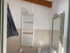a bathroom with a shower and a mirror at Finale Ligure Gorra Rooms Rosa di Mare vicino al mare lontano dal caos! in Borgio Verezzi +72 photos
