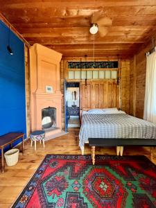 Postel nebo postele na pokoji v ubytování Shromantic Garden
