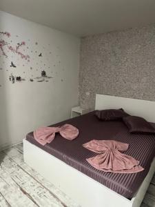 Postel nebo postele na pokoji v ubytování AmA