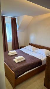 Posteľ alebo postele v izbe v ubytovaní GORGANY resort & SPA