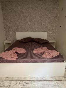 Postel nebo postele na pokoji v ubytování AmA