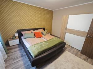 Ένα ή περισσότερα κρεβάτια σε δωμάτιο στο Apartments Faak