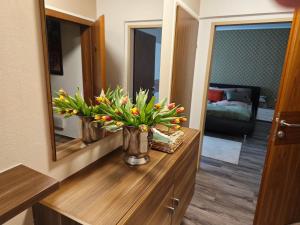Ένα ή περισσότερα κρεβάτια σε δωμάτιο στο Apartments Faak