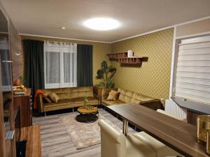 Χώρος καθιστικού στο Apartments Faak