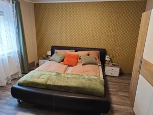 Ένα ή περισσότερα κρεβάτια σε δωμάτιο στο Apartments Faak