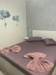 Postel nebo postele na pokoji v ubytování AmA
