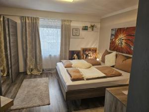 Voodi või voodid majutusasutuse Apartments Faak toas