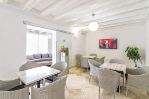 Телевизор и/или развлекательный центр в Hotel Vecchia Marina