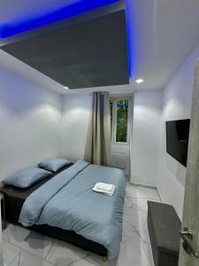 Postel nebo postele na pokoji v ubytování Suite Cosy Chic